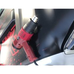 MAGNETIC STRAP DESIGNED TO HOLD HEAT GUN OR TORCH WHILE WINDOW TINTING OR VINYL WRAP IS BEING INSTALLED